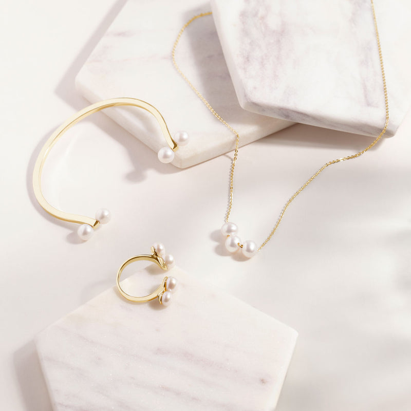 The Mother of Pearl set in Yellow Gold